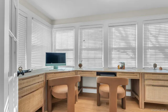 a kitchen with stainless steel appliances granite countertop a sink and a refrigerator