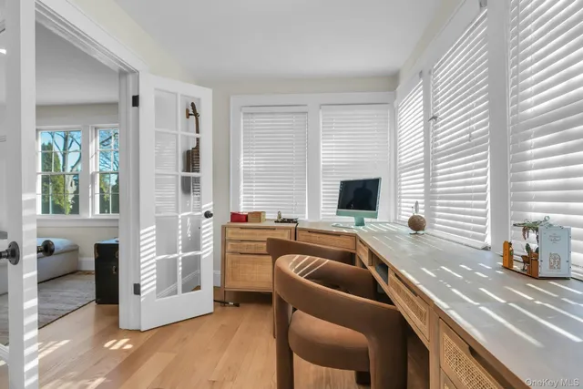 a white toilet sitting next to a white sink