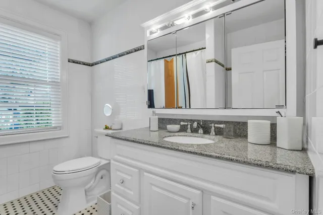 a bed room with a bed and a couch