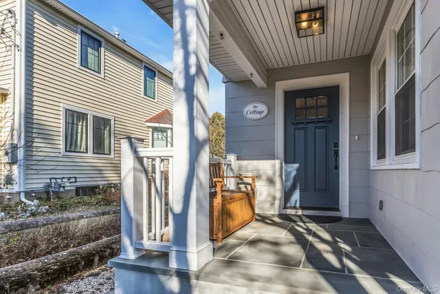 a view of a house with wooden walls