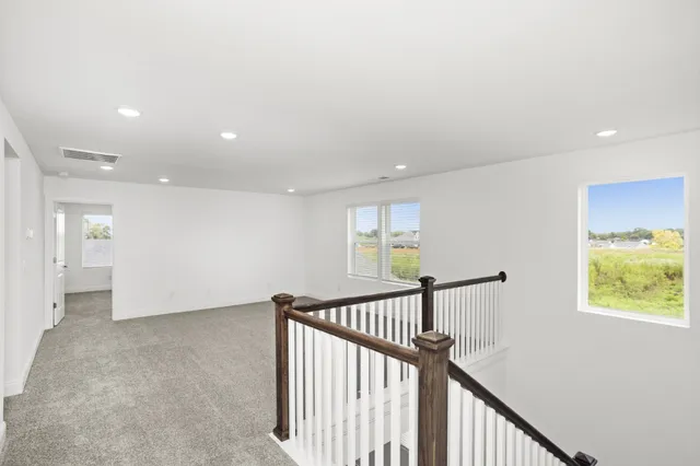 a view of hallway with stairs