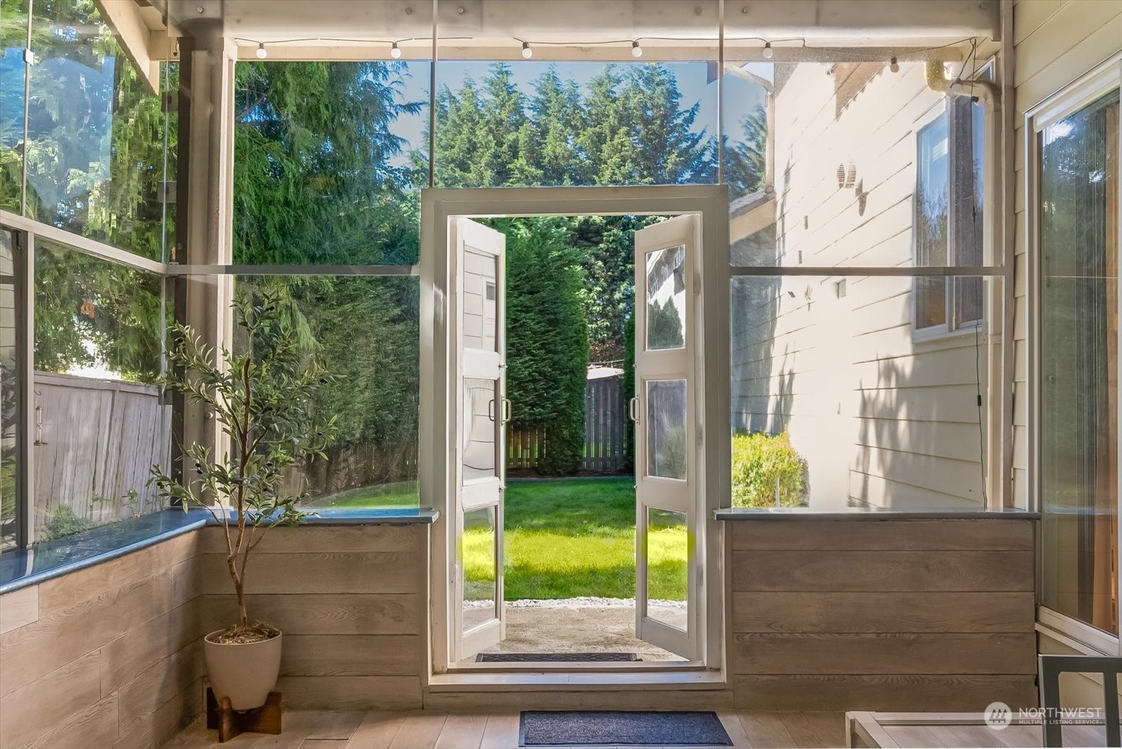 5407 Northeast 3rd Place Renton, WA 98059 - Photo 35 of 39 a view of a room with a large window and front door