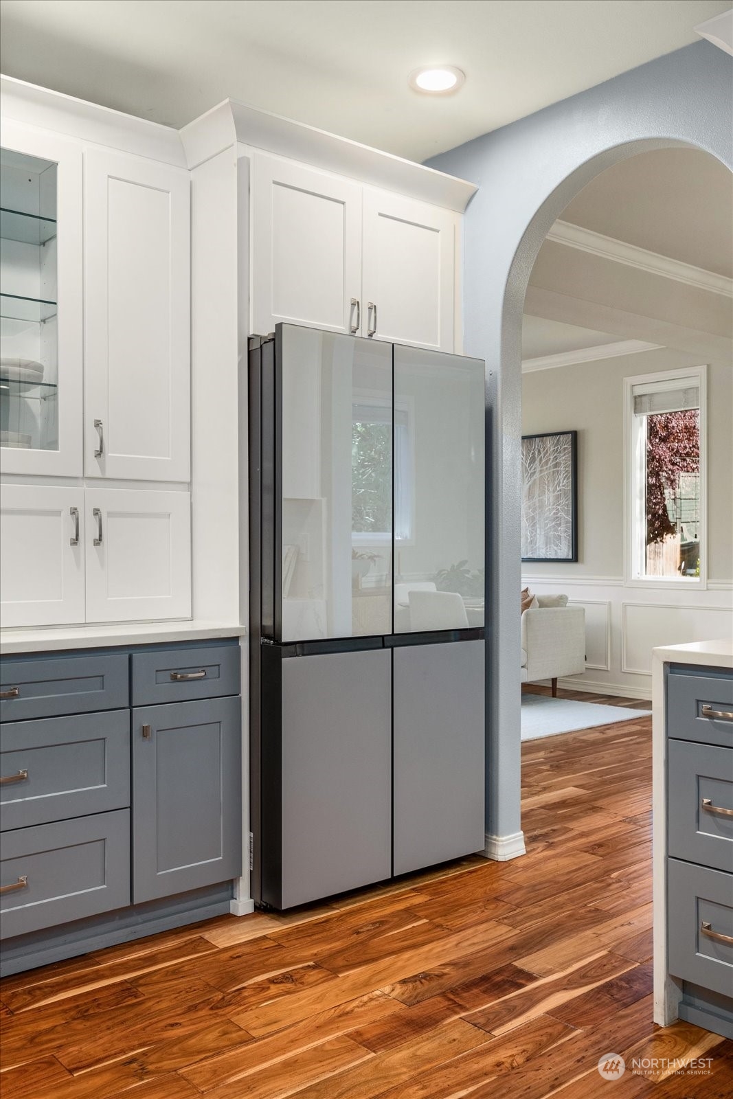 5407 Northeast 3rd Place Renton, WA 98059 - Photo 10 of 39 a view of a kitchen with wooden cabinet and a refrigerator