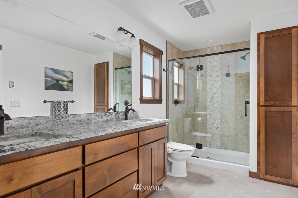 1471 North View Road Oak Harbor, WA 98277 - Photo 20 of 38 a bathroom with a granite countertop sink toilet tub and shower