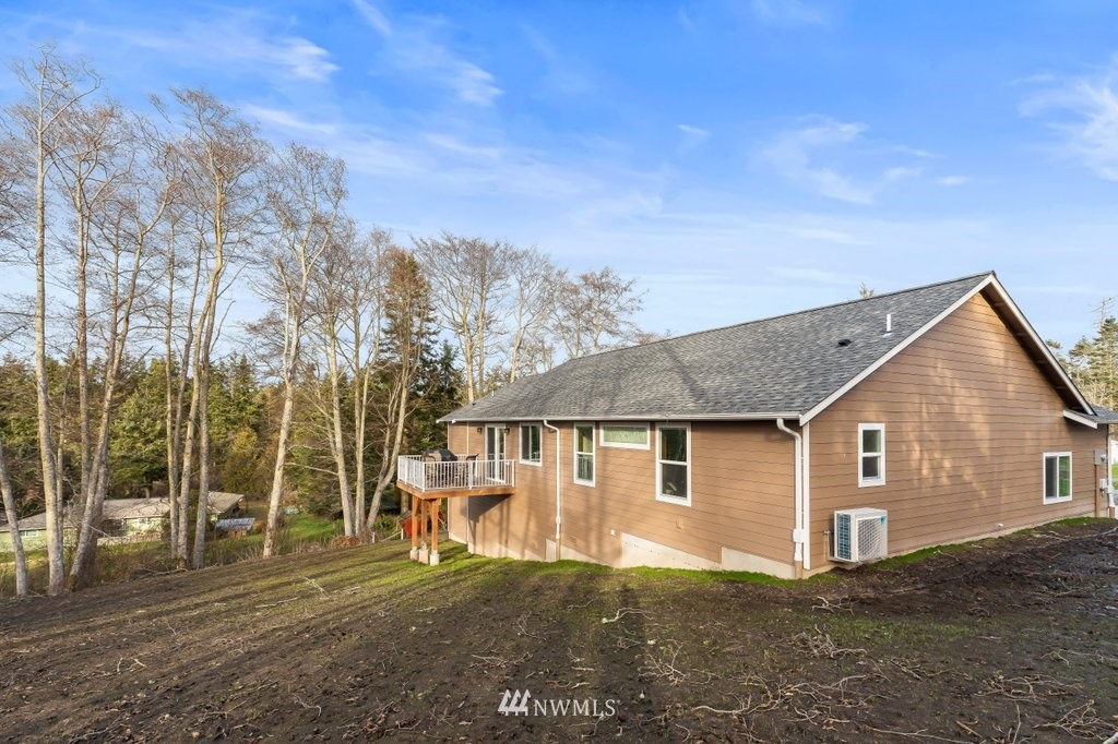 1471 North View Road Oak Harbor, WA 98277 - Photo 35 of 38 a view of a house with a yard