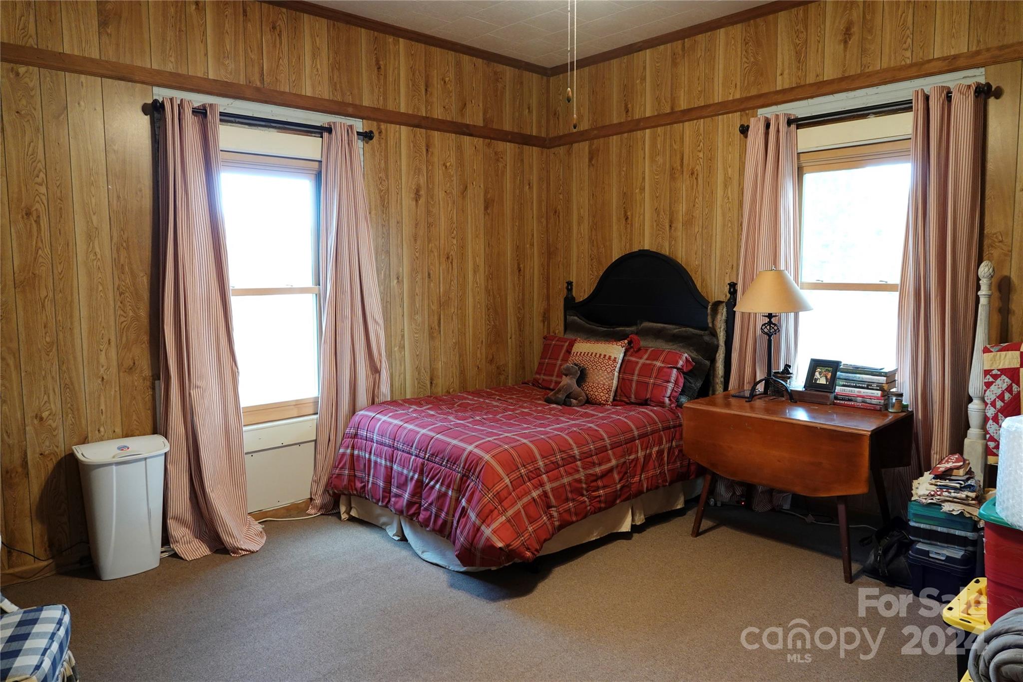 1276 Golf Course Road Tryon, NC 28782 - Photo 25 of 28 a bedroom with a bed and a window