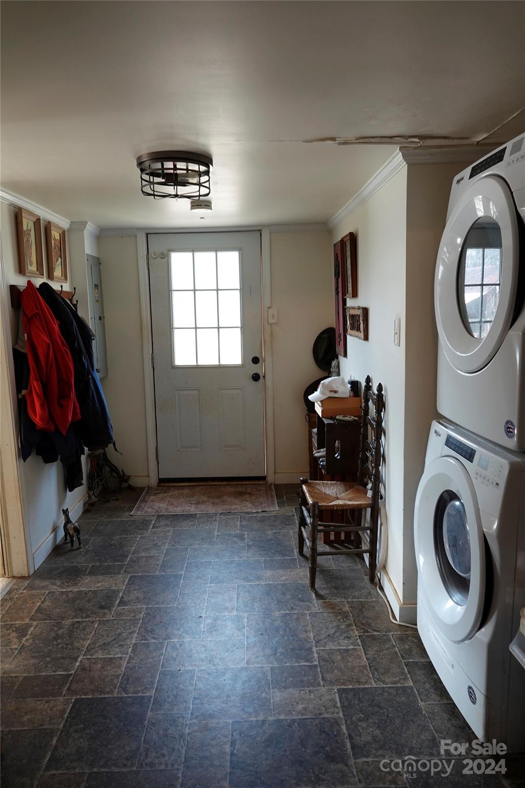 1276 Golf Course Road Tryon, NC 28782 - Photo 27 of 28 a view of a storage & utility room with washer and dryer