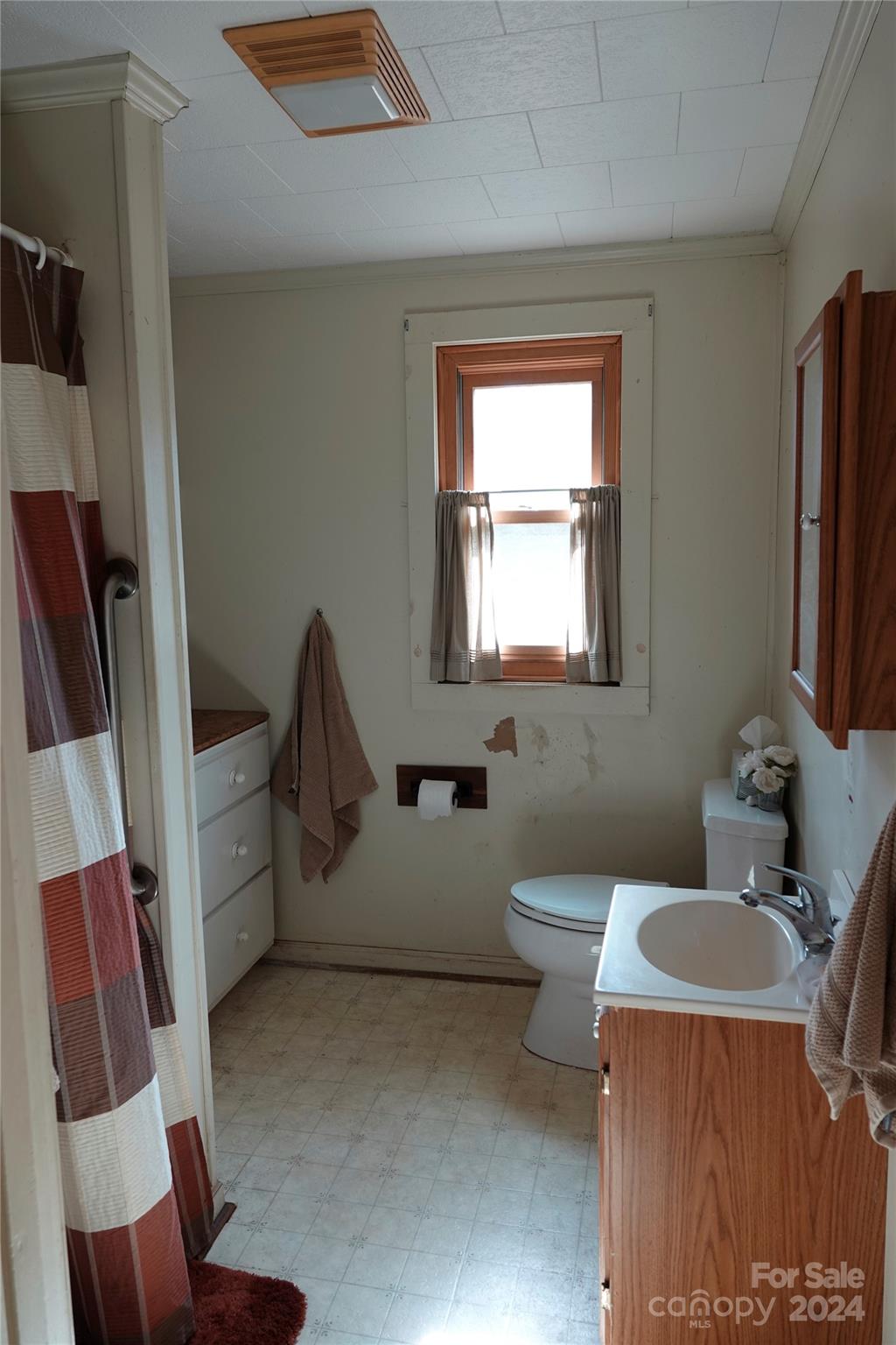 1276 Golf Course Road Tryon, NC 28782 - Photo 28 of 28 a bathroom with a sink toilet and shower
