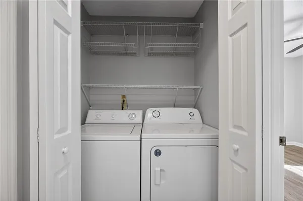 a utility room with dryer and washer