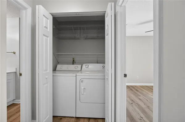 a utility room with dryer and washer