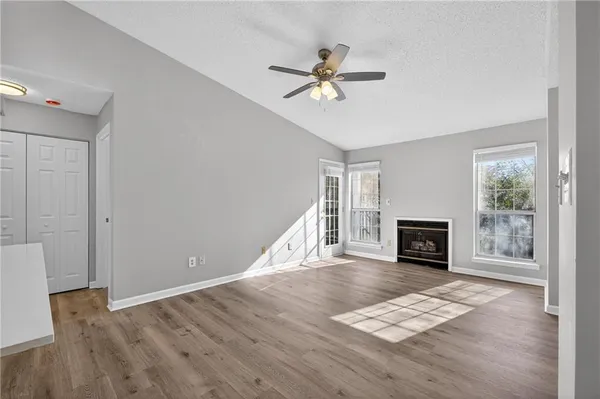 a view of livingroom with furniture wooden floor and window