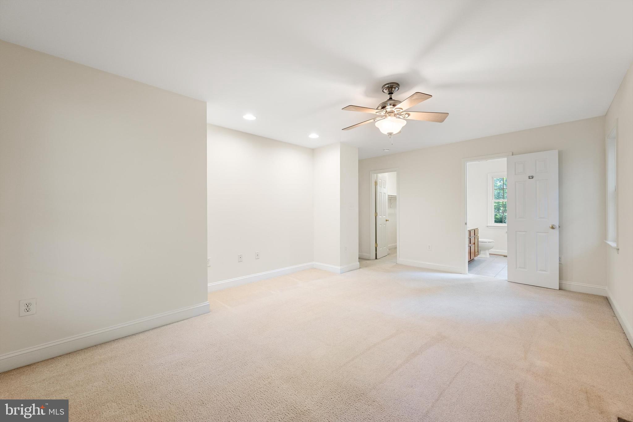 175 Easy Hollow Road Front Royal, VA 22630 - Photo 22 of 42 an empty room with fan and a ceiling fan