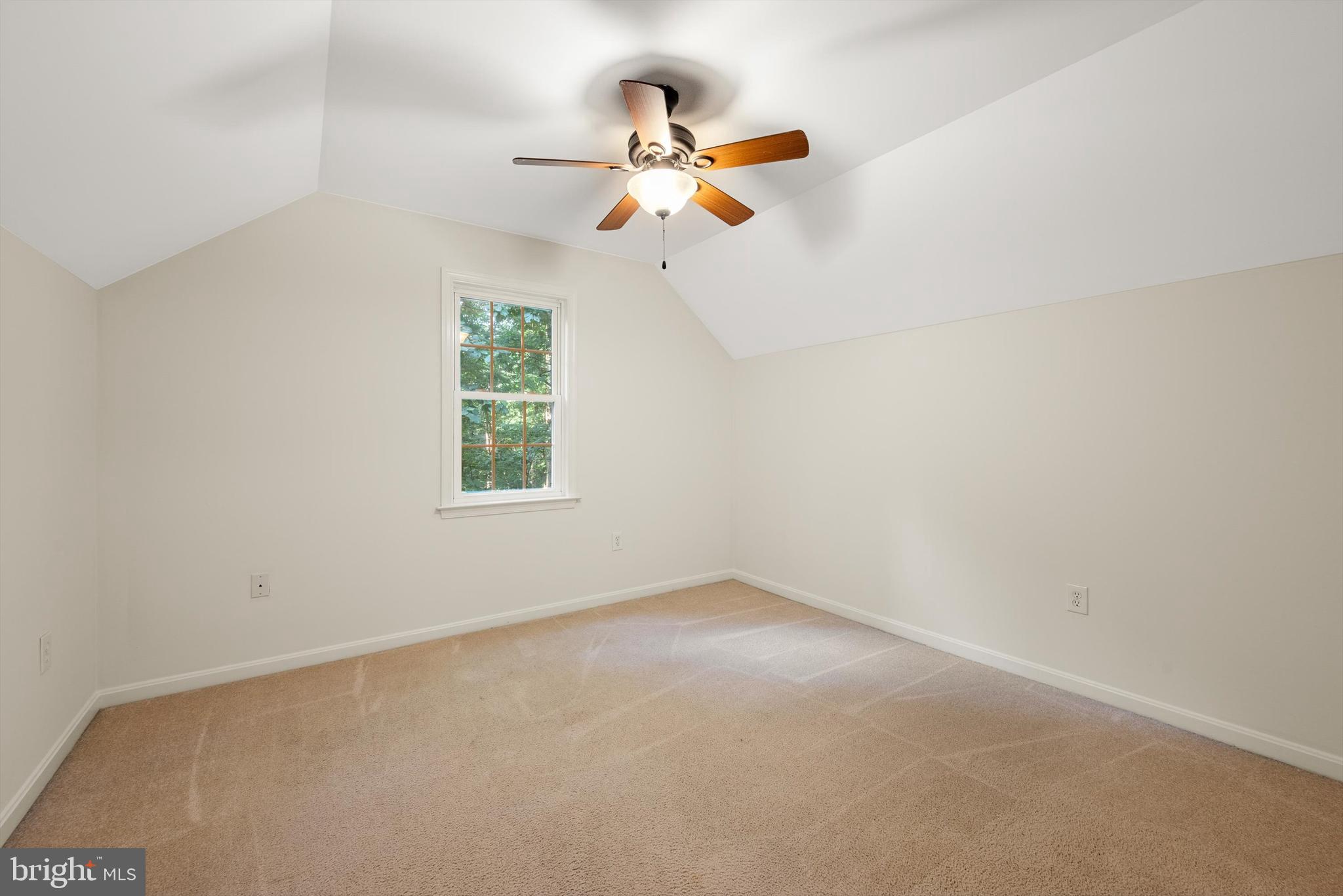 175 Easy Hollow Road Front Royal, VA 22630 - Photo 27 of 42 an empty room with a window and a fan