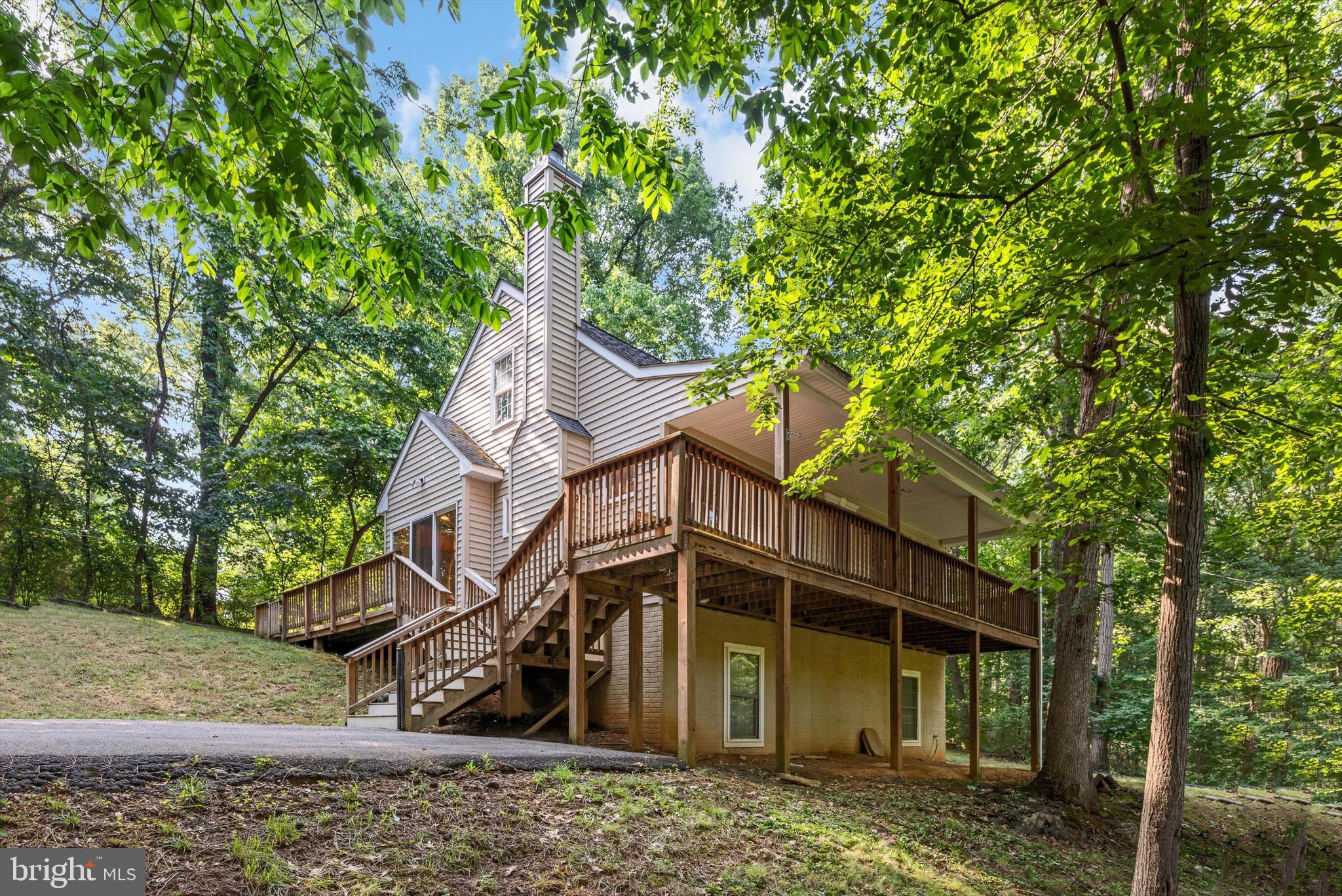 175 Easy Hollow Road Front Royal, VA 22630 - Photo 3 of 42 a view of a house with a yard