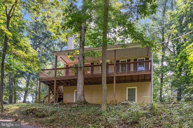 front view of house with a tree