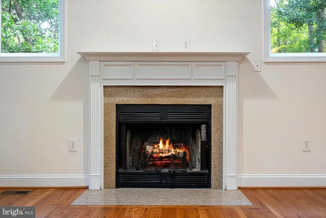 a living room with a fireplace
