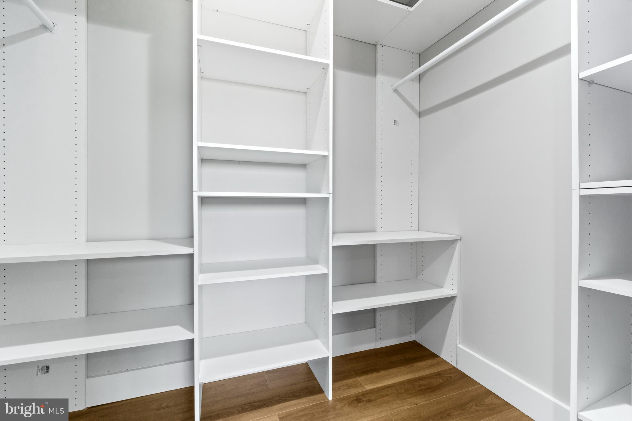4534 Old Court Road Baltimore, MD 21208 - Photo 11 of 26 a view of walk in closet with empty racks