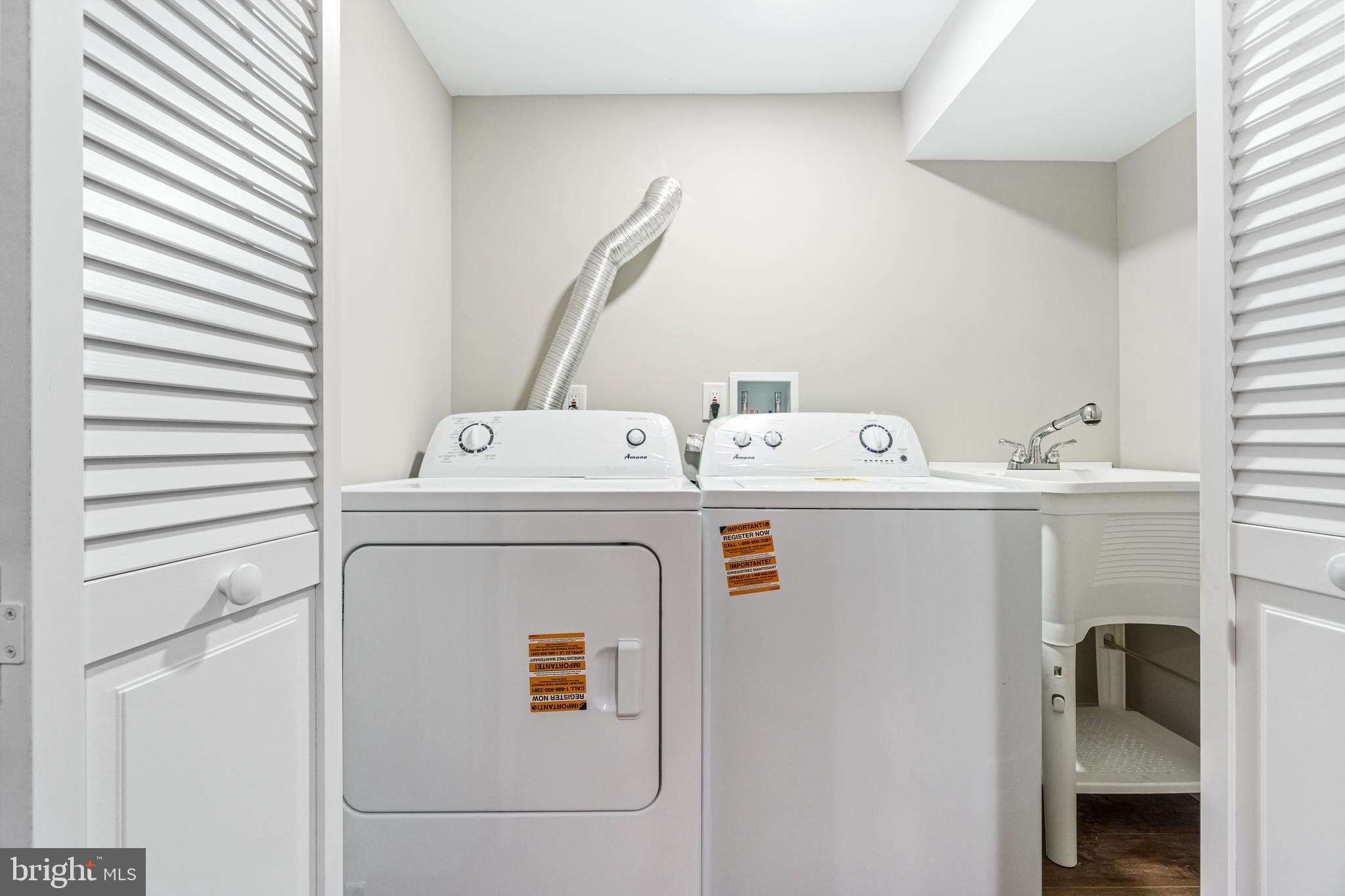 4534 Old Court Road Baltimore, MD 21208 - Photo 23 of 26 a utility room with dryer and washer