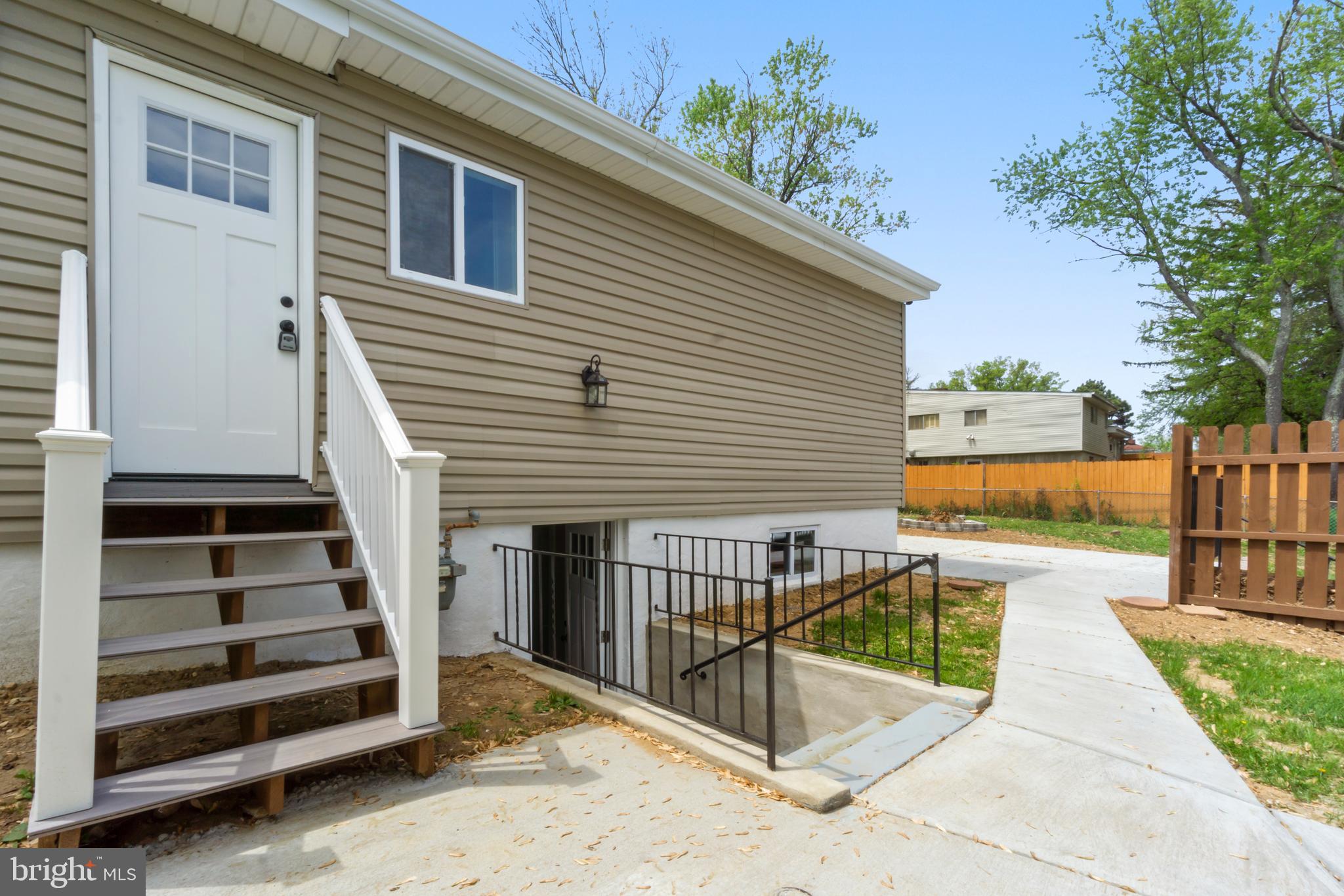 4534 Old Court Road Baltimore, MD 21208 - Photo 25 of 26 a view of a house with a balcony and stairs