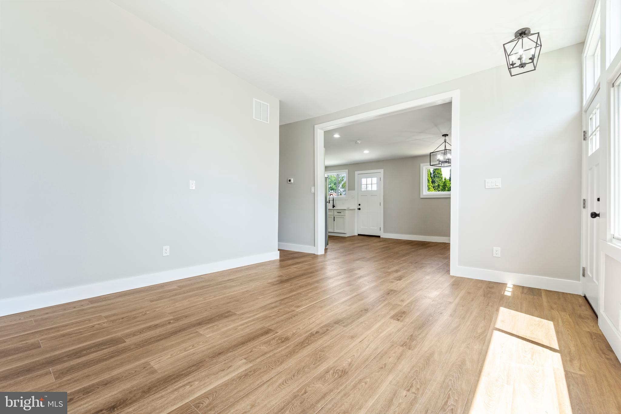4534 Old Court Road Baltimore, MD 21208 - Photo 5 of 26 wooden floor in an empty room