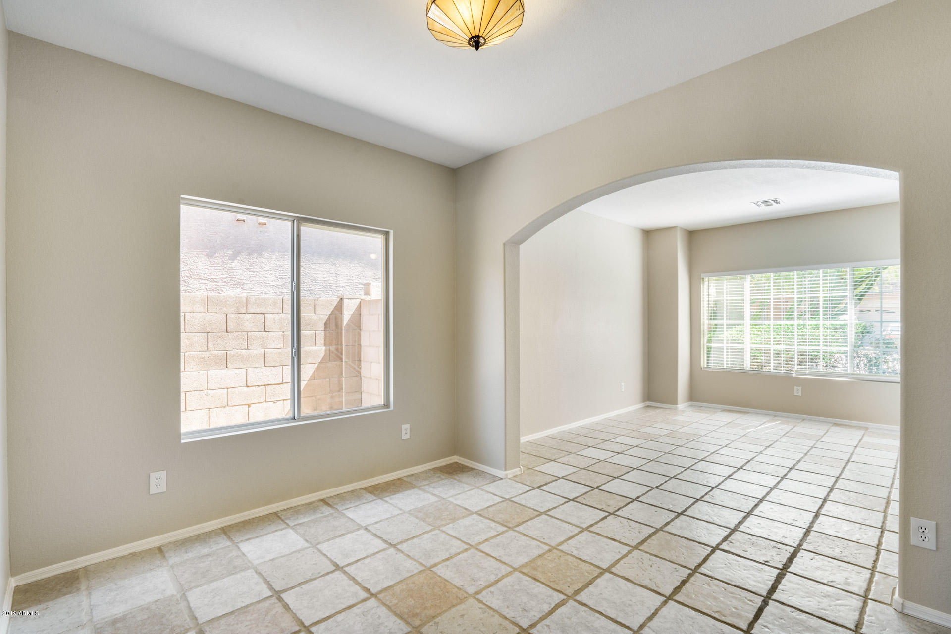 4522 East Rowel Road Phoenix, AZ 85050 - Photo 12 of 37 a view of an empty room and window
