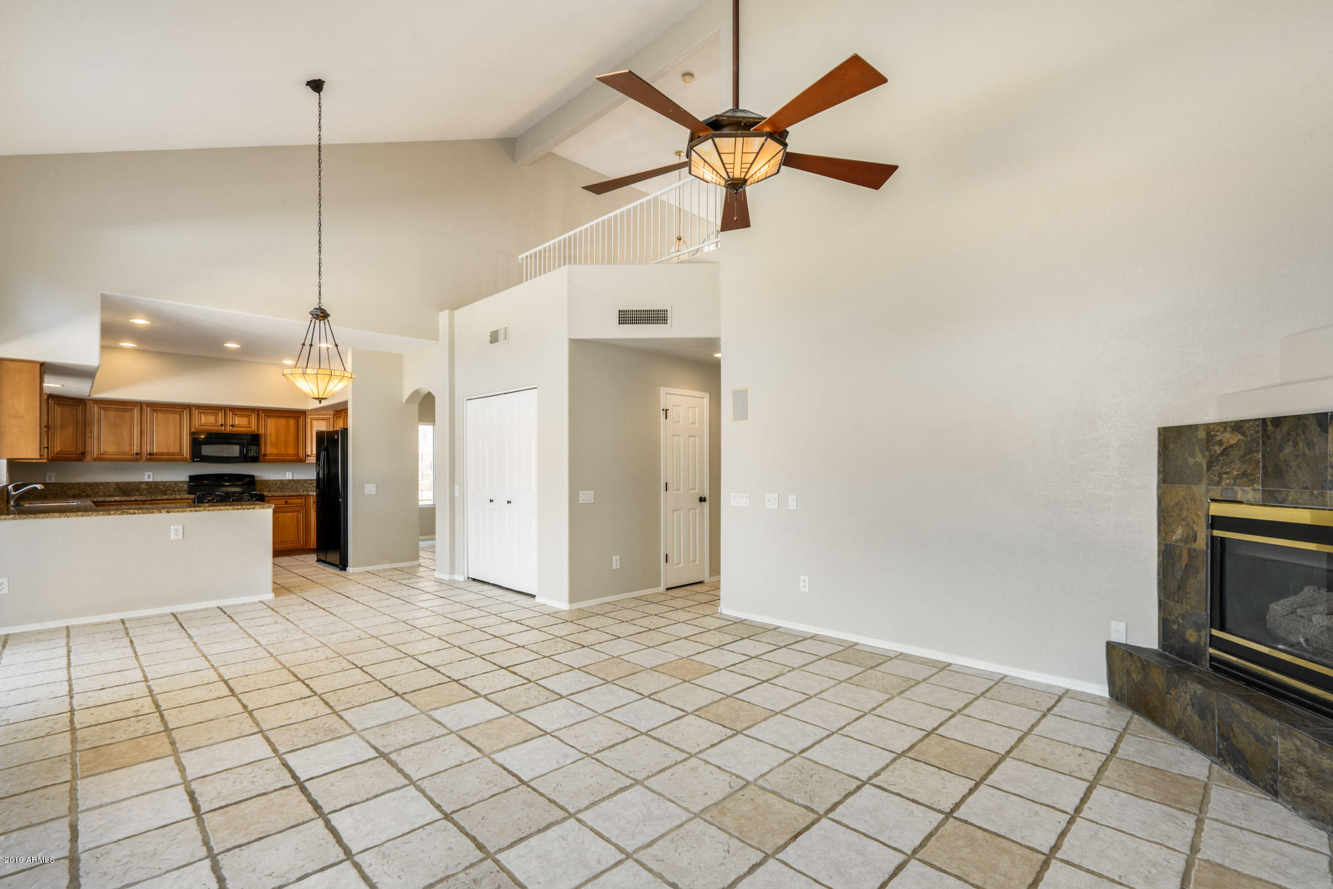 4522 East Rowel Road Phoenix, AZ 85050 - Photo 17 of 37 a view of a kitchen with a sink and a stove top oven