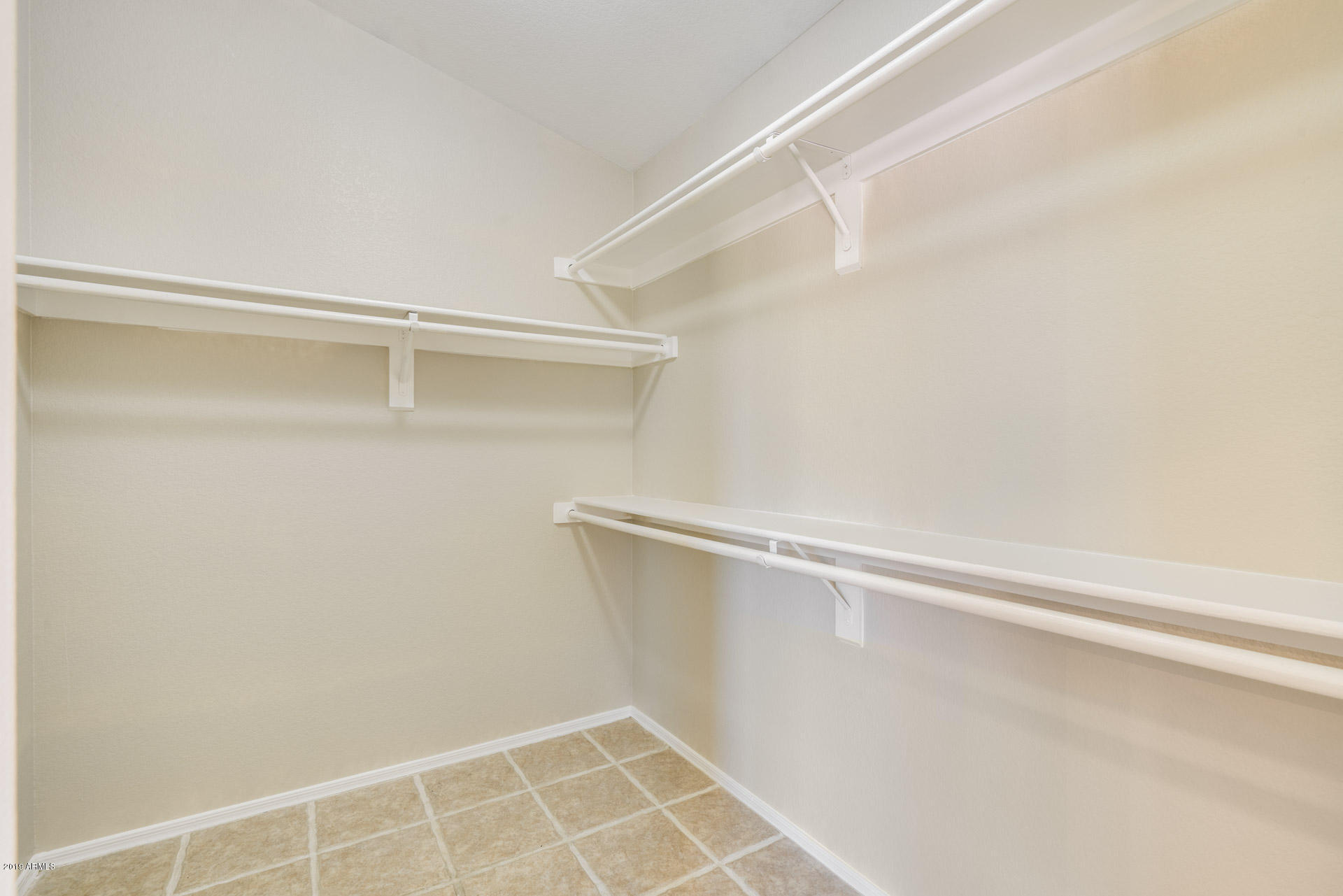4522 East Rowel Road Phoenix, AZ 85050 - Photo 26 of 37 a view of an empty walk in closet