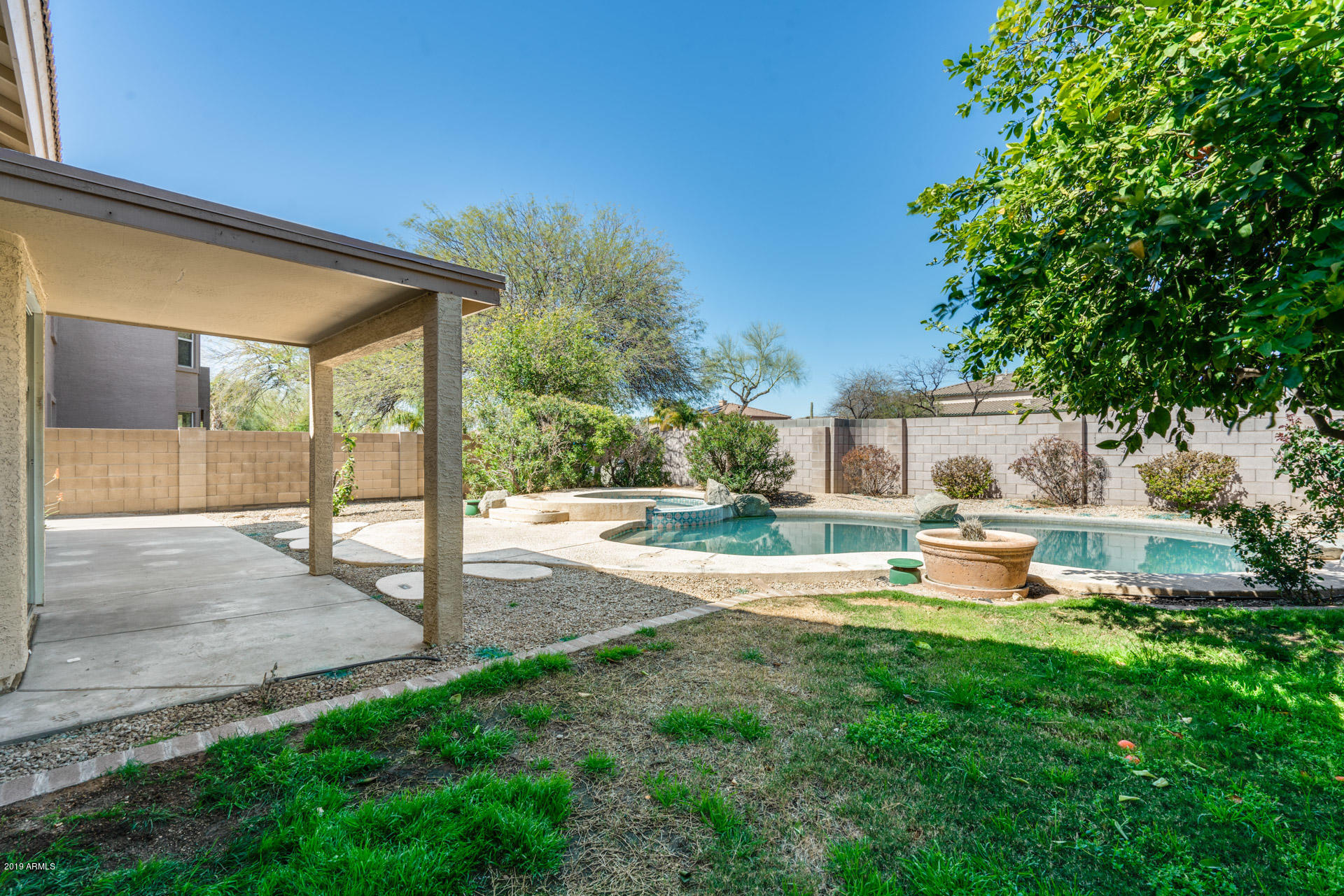 4522 East Rowel Road Phoenix, AZ 85050 - Photo 36 of 37 a view of a house with backyard and sitting area