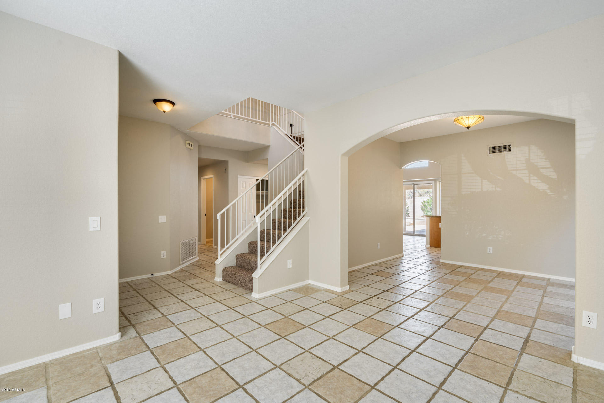 4522 East Rowel Road Phoenix, AZ 85050 - Photo 4 of 37 a view of a hallway view with staircase