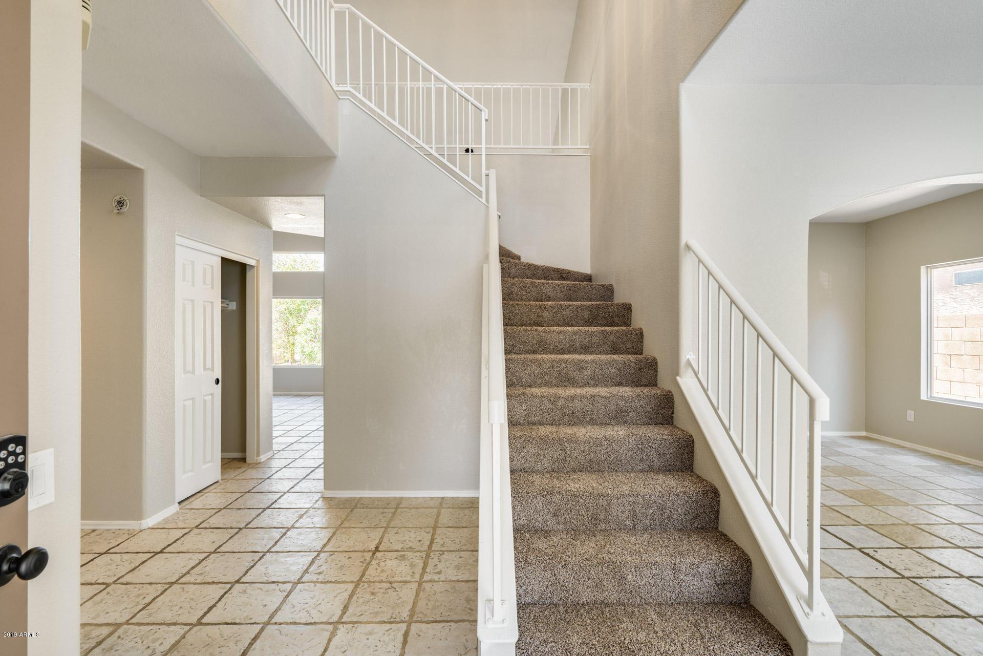 4522 East Rowel Road Phoenix, AZ 85050 - Photo 9 of 37 a view of an entryway with wooden floor