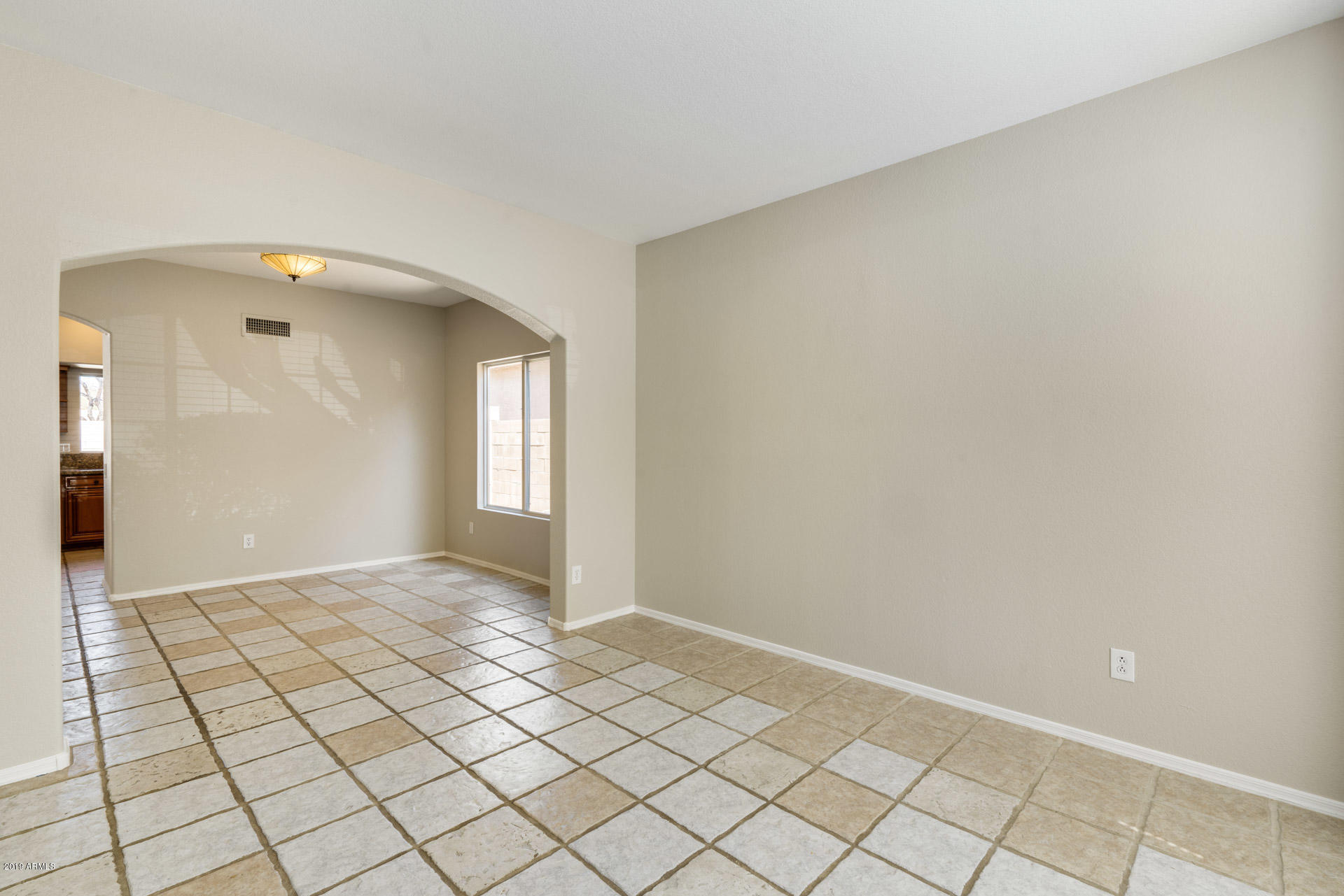 4522 East Rowel Road Phoenix, AZ 85050 - Photo 10 of 37 a view of an empty room and window