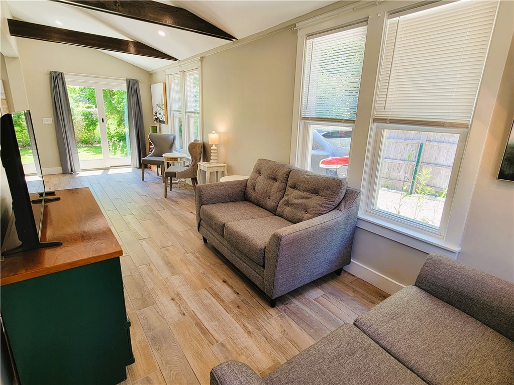 129 Connection Street Newport, RI 02840 - Photo 5 of 23 Living room with exposed beams and comfy couches
