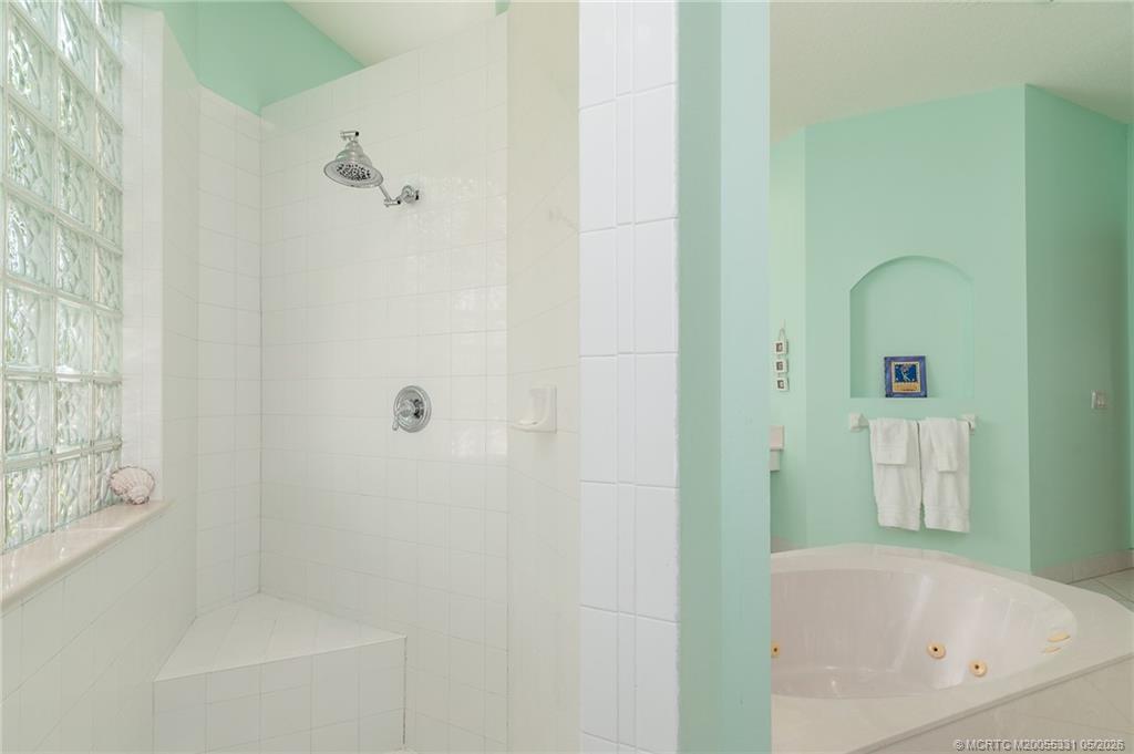 2216 Southeast Stonehaven Road Port St. Lucie, FL 34952 - Photo 20 of 67 a bathroom with a bathtub