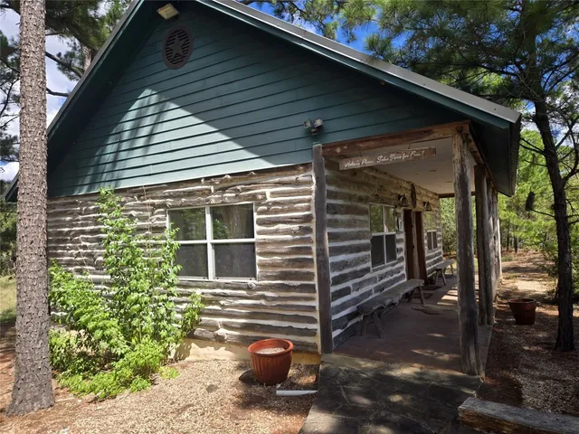 a view of a porch with a bench