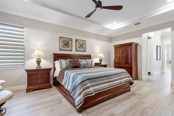 a view of a bathroom with a sink and mirror
