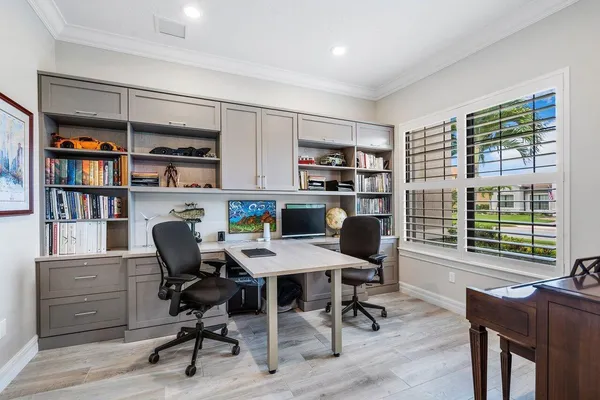 a bathroom with a sink toilet a mirror and shower