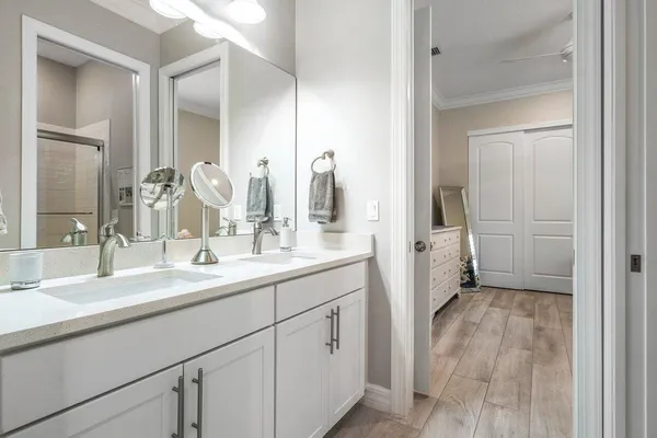 a kitchen with a stove a sink and a refrigerator