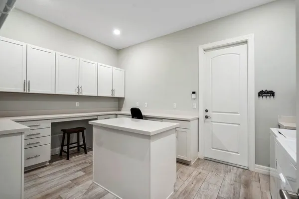 a swimming pool with outdoor seating and yard