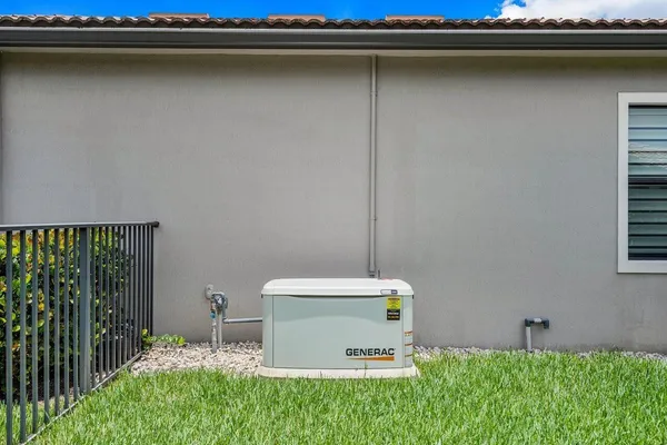 a view of a swimming pool with a table and chairs