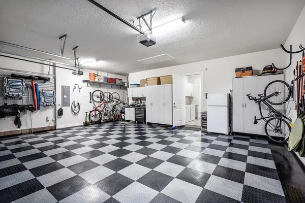 an aerial view of a house with a lake view