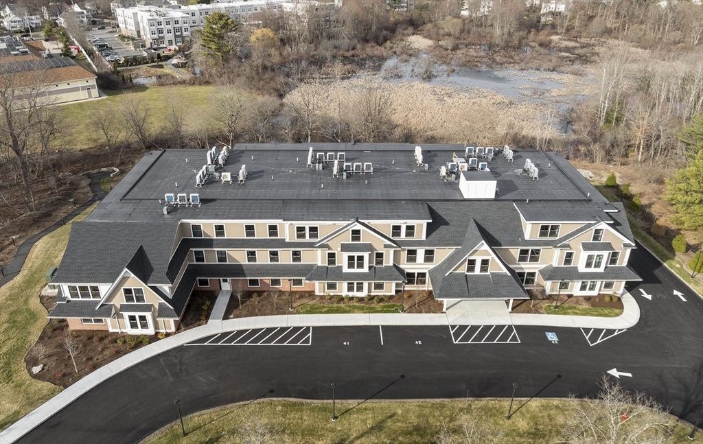 26 Union Street, Unit 102 Natick, MA 01760 - Photo 1 of 10 a view of a house with a street