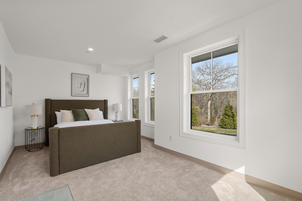 26 Union Street, Unit 102 Natick, MA 01760 - Photo 6 of 10 a living room with furniture and a window