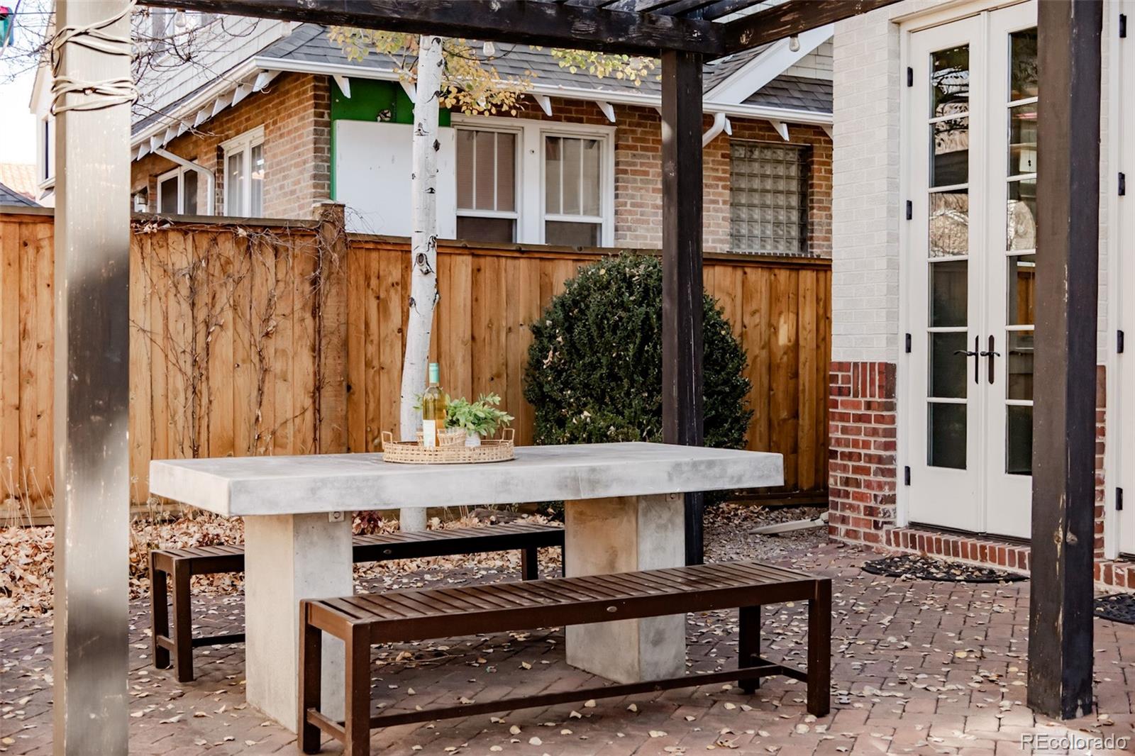4535 Montview Boulevard Denver, CO 80207 - Photo 16 of 24 a view of a two chairs and table in the balcony