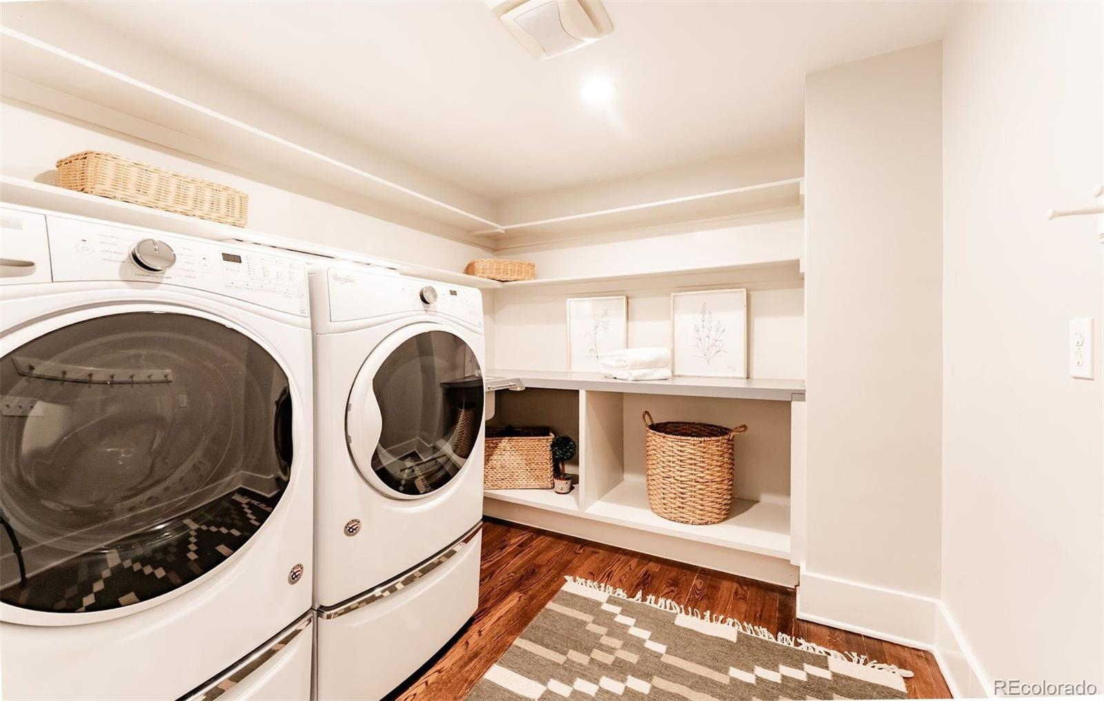 4535 Montview Boulevard Denver, CO 80207 - Photo 17 of 27 a utility room with dryer and washer
