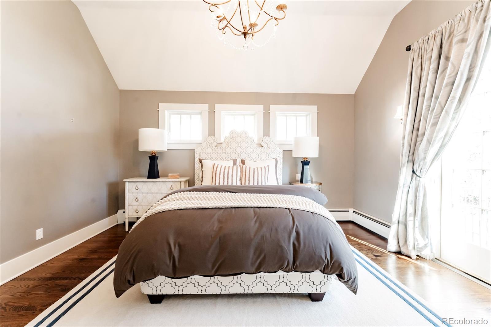 4535 Montview Boulevard Denver, CO 80207 - Photo 20 of 24 a room with a bed and window