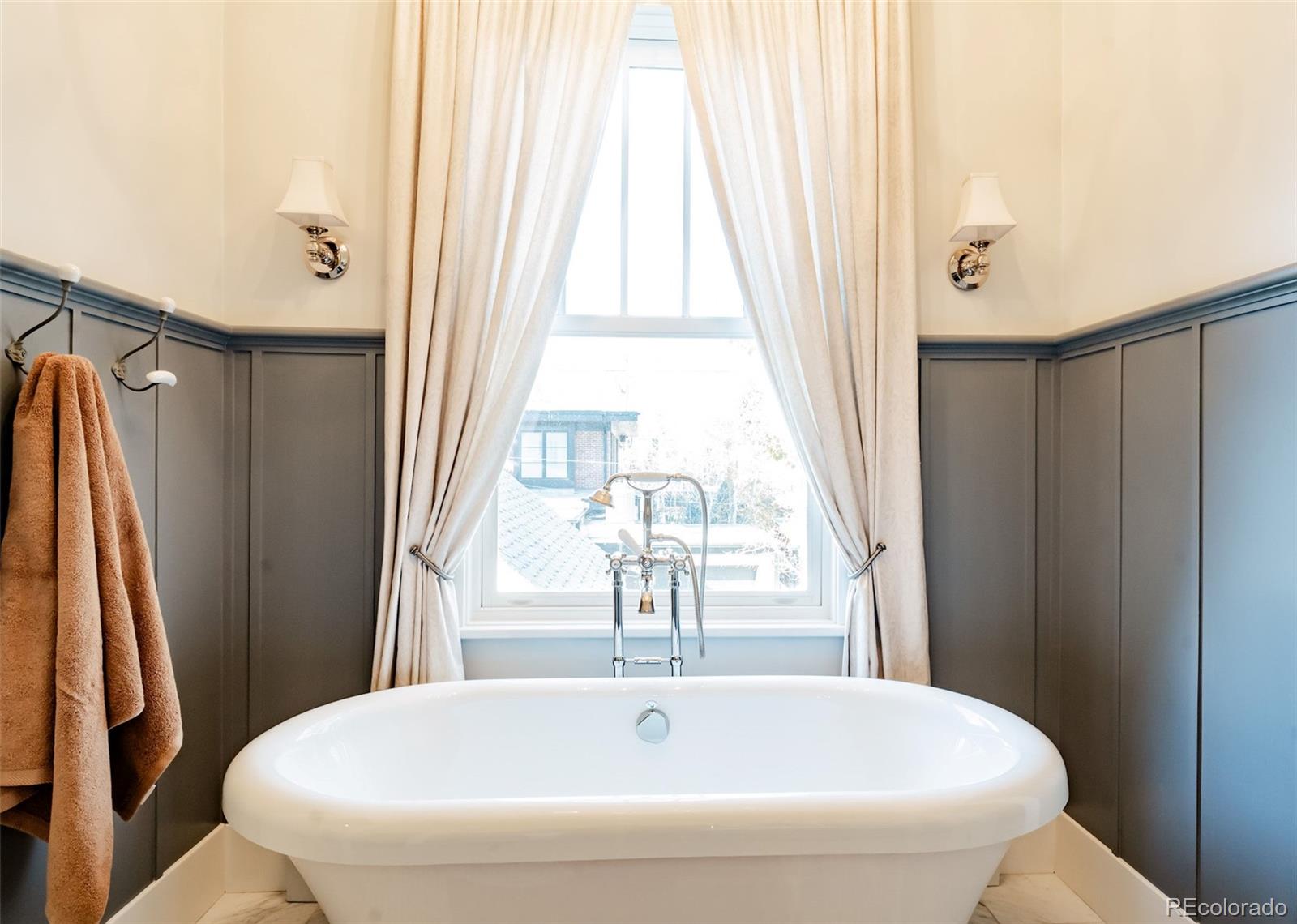 4535 Montview Boulevard Denver, CO 80207 - Photo 21 of 24 a bathroom with a bathtub and shower