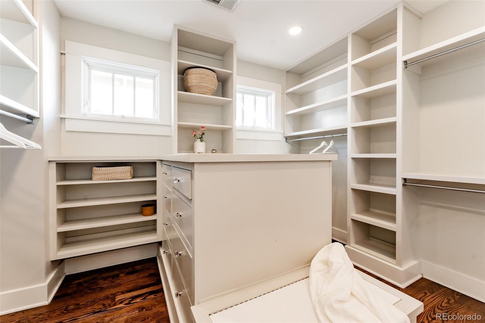 4535 Montview Boulevard Denver, CO 80207 - Photo 10 of 24 a view of walk in closet with empty racks
