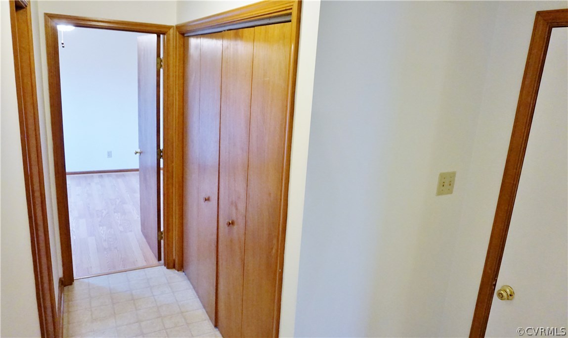 613 Rebel Ridge Road Colonial Heights, VA 23834 - Photo 14 of 40 Hallway from kitchen leading to the 2car garage, l