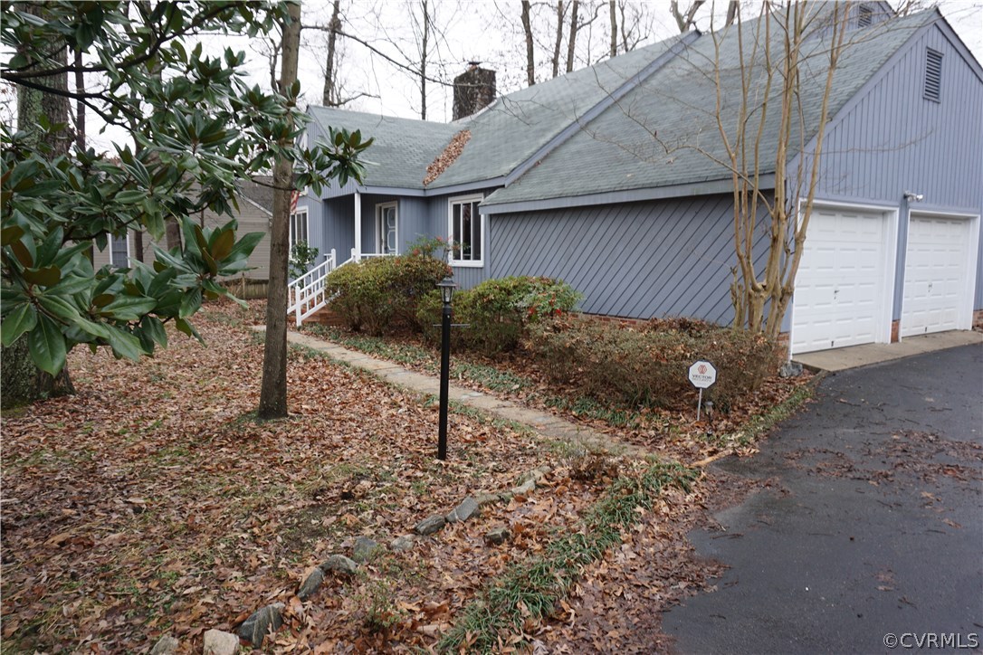 613 Rebel Ridge Road Colonial Heights, VA 23834 - Photo 38 of 40 Outside home with paved driveway into 2 car garage