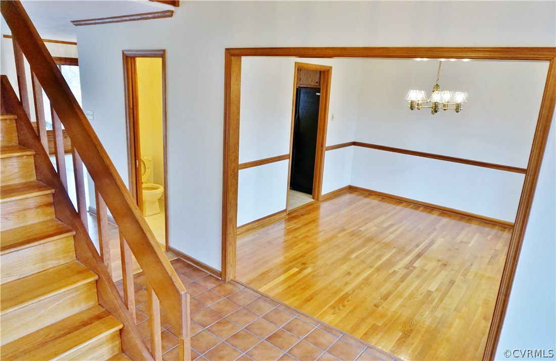 613 Rebel Ridge Road Colonial Heights, VA 23834 - Photo 7 of 40 Formal dining room hardwood floor.